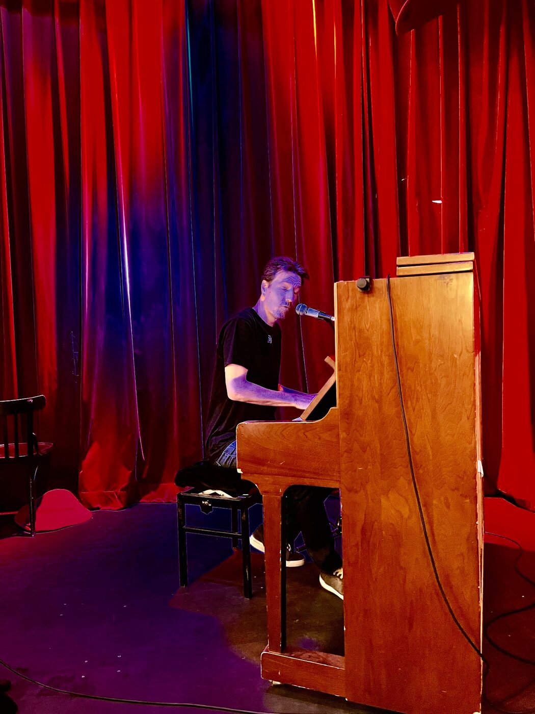 Matjaž Ferenc performing at the piano, Munich Song Contest