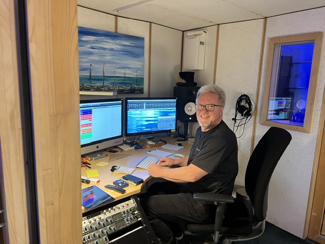 Producer at the studio mixing desk